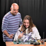 Father and daughter assembling a Yak9 kit for creative family time and practical skills