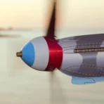 Close up of Yak9 weathervane propeller in French tricolor spinning in the wind