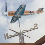 Airplane weathervane spinning against the sky showcases the result of working with Bf109 kinetic construction kit