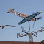 Observation of spinning Bf109 stainless steel kinetic wind sculpture and flying bird acts as a stress reliever