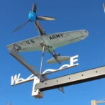 Stainless steel Bell P39 Airacobra Full Kit model operating as an outdoor wind driven weathervane